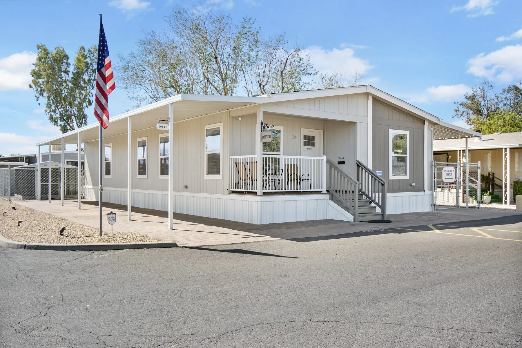 The Paradise Groves community office, with its flagpole out front