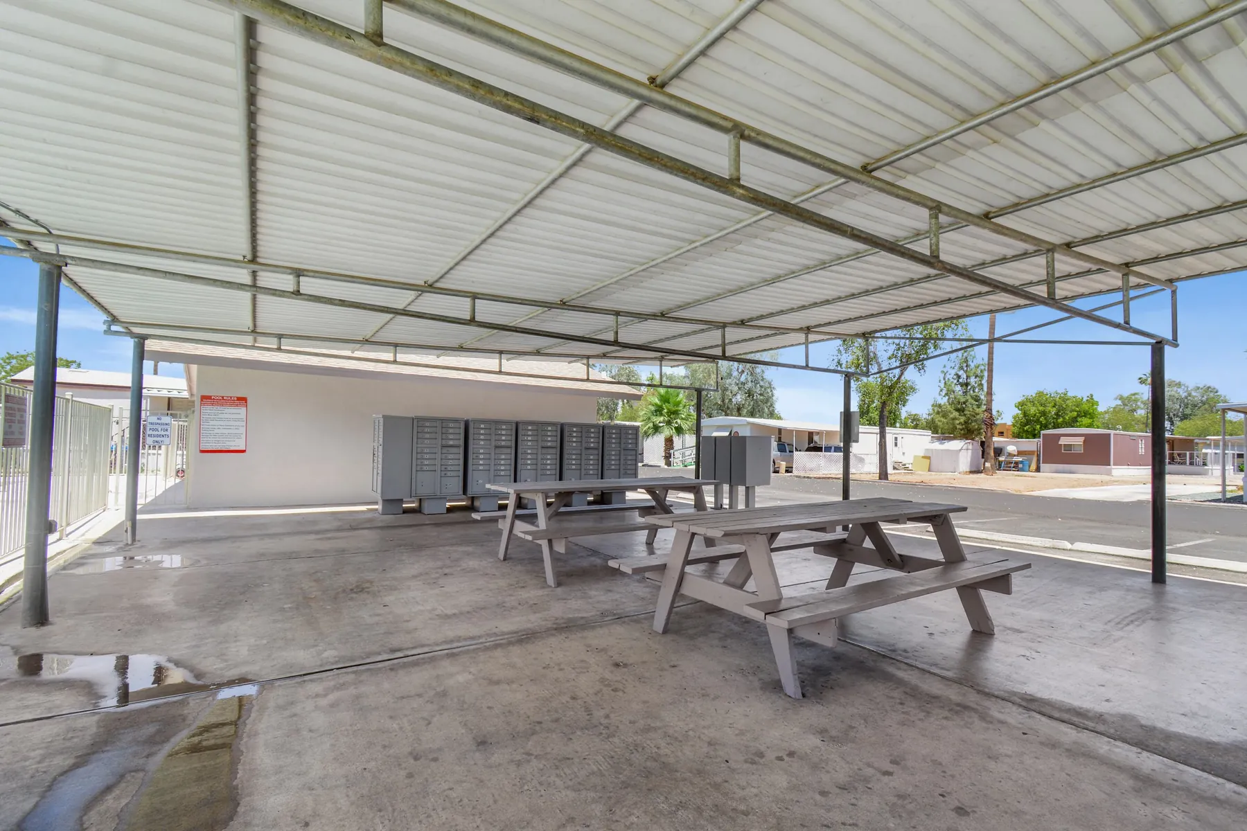 Ramada with picnic tables and mailboxes
