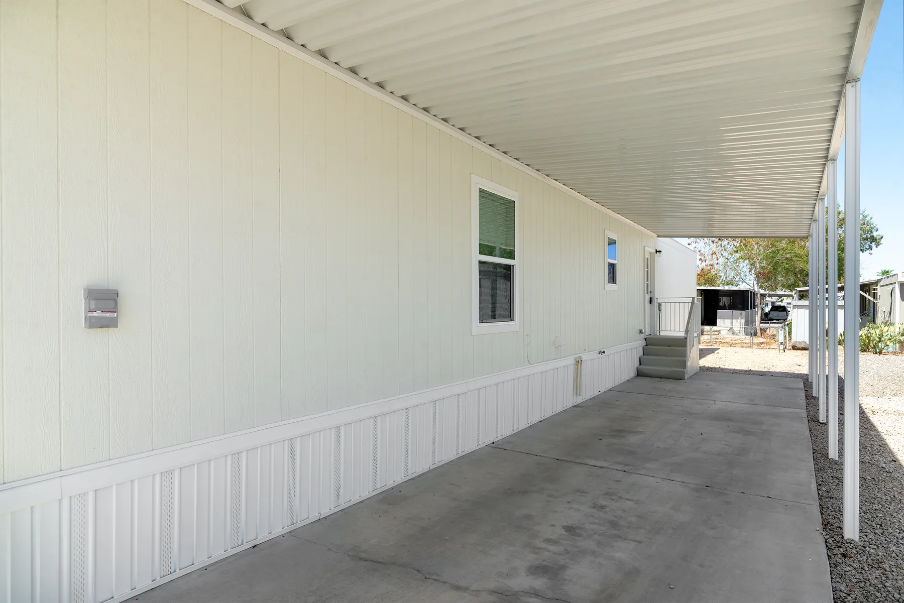 Covered carport toward the side entry
