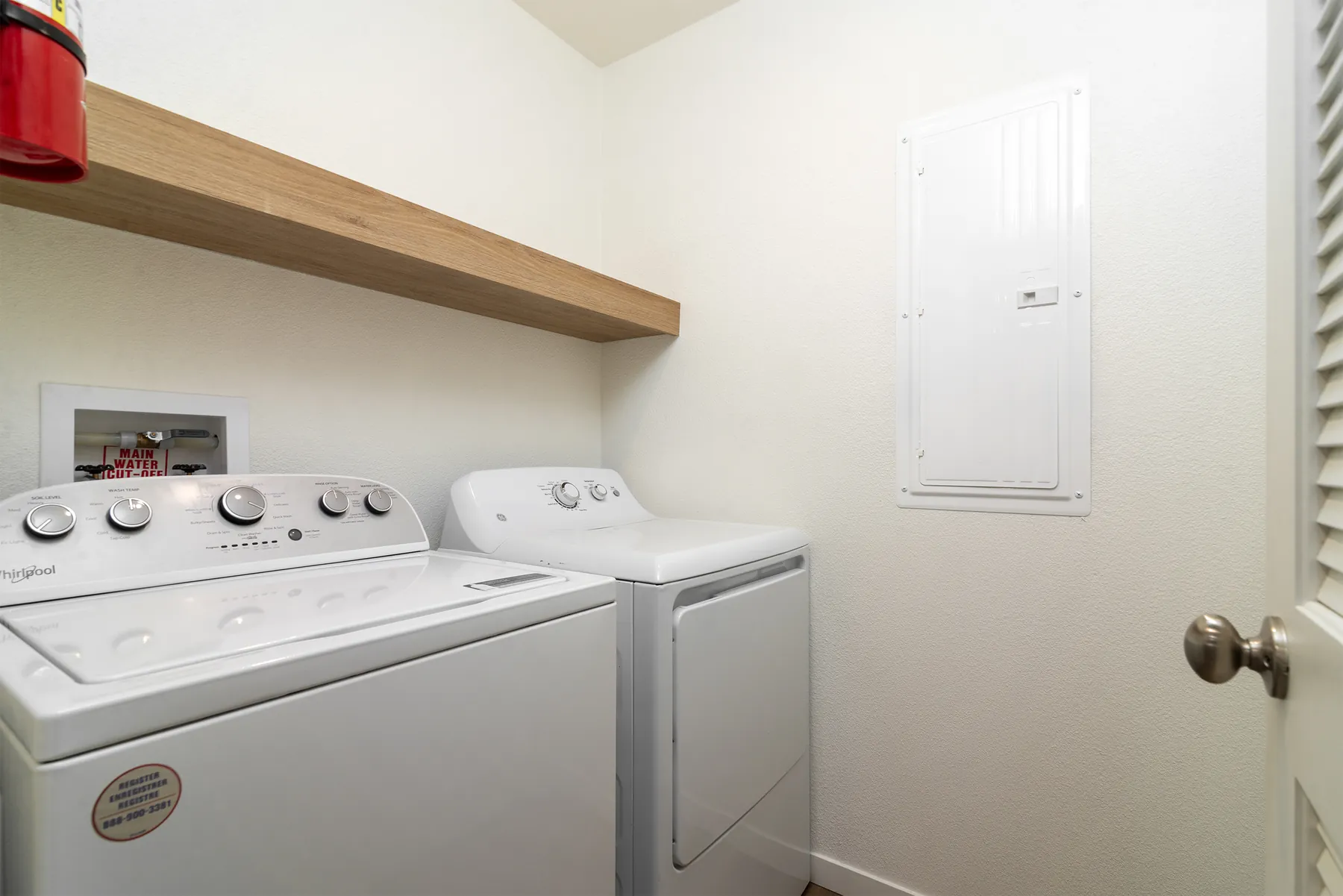 Laundry closet with washer and dryer